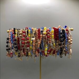 Huge bundle lot 58 beaded roll on stretch charm bracelets with bars stack layer.